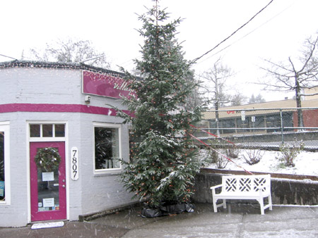 Snow on the village Christmas Tree